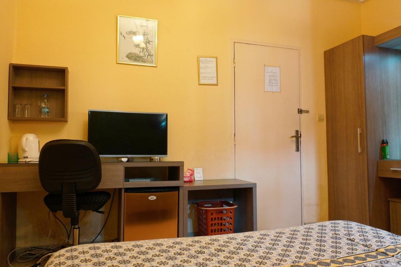 Petit Motel Beijing Абиджан Екстериор снимка