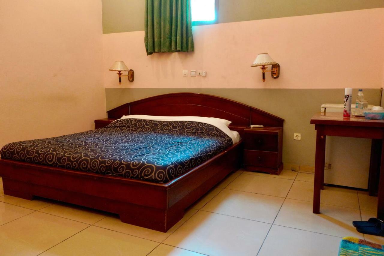 Petit Motel Beijing Абиджан Екстериор снимка