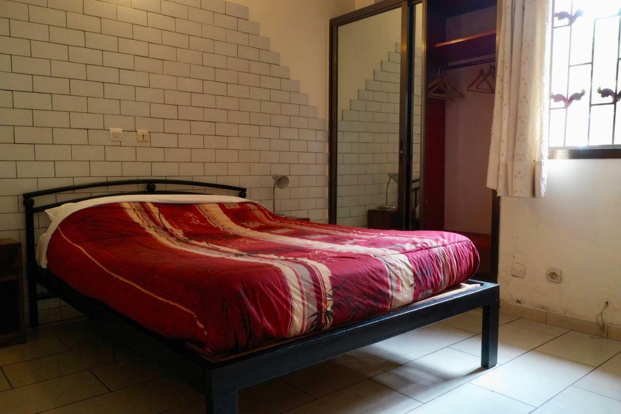 Petit Motel Beijing Абиджан Екстериор снимка